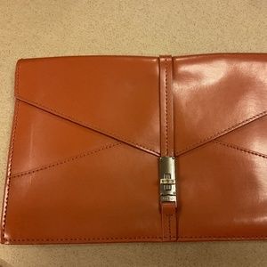 Brown leather envelope clutch
